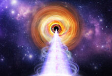 This artist’s concept depicts the central region of the blazar BL Lacertae, a supermassive black hole surrounded by a bright disk and a jet oriented toward Earth. Image credit: NASA / Pablo Garcia.