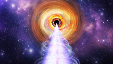 This artist’s concept depicts the central region of the blazar BL Lacertae, a supermassive black hole surrounded by a bright disk and a jet oriented toward Earth. Image credit: NASA / Pablo Garcia.