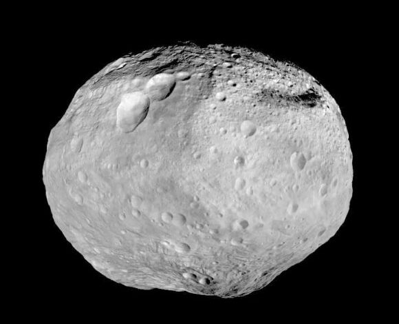 As NASA’s Dawn spacecraft takes off for its next destination, this mosaic synthesizes some of the best views the spacecraft had of the giant asteroid Vesta. Dawn studied Vesta from July 2011 to September 2012. The towering mountain at the south pole -- more than twice the height of Mount Everest -- is visible at the bottom of the image. The set of three craters known as the ‘snowman’ can be seen at the top left. Image credit: NASA / JPL-Caltech / UCLA / MPS / DLR / IDA.