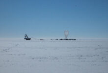 ANITA was placed in Antarctica because there is little chance of interference from other signals; to capture the emission signals, the balloon-borne radio detector is sent to fly over stretches of ice, capturing what are called ice showers. Image credit: Stephanie Wissel / Penn State.