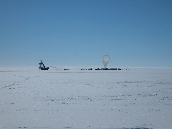 ANITA was placed in Antarctica because there is little chance of interference from other signals; to capture the emission signals, the balloon-borne radio detector is sent to fly over stretches of ice, capturing what are called ice showers. Image credit: Stephanie Wissel / Penn State.