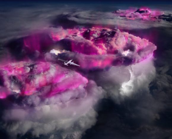 NASA’s high-flying ER-2 airplane carries instrumentation in this artist’s impression of the Airborne Lightning Observatory for Fly’s Eye Geostationary Lightning Mapper Simulator and Terrestrial Gamma-ray Flashes (ALOFT) mission to record gamma rays (colored purple for illustration) from thunderclouds. Image credit: NASA / ALOFT team.