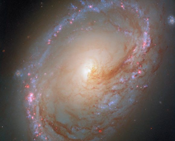 This Hubble image shows Messier 96, a spiral galaxy some 34 million light-years away in the constellation of Leo. Image credit: NASA / ESA /Hubble / F. Belfiore / D. Calzetti.