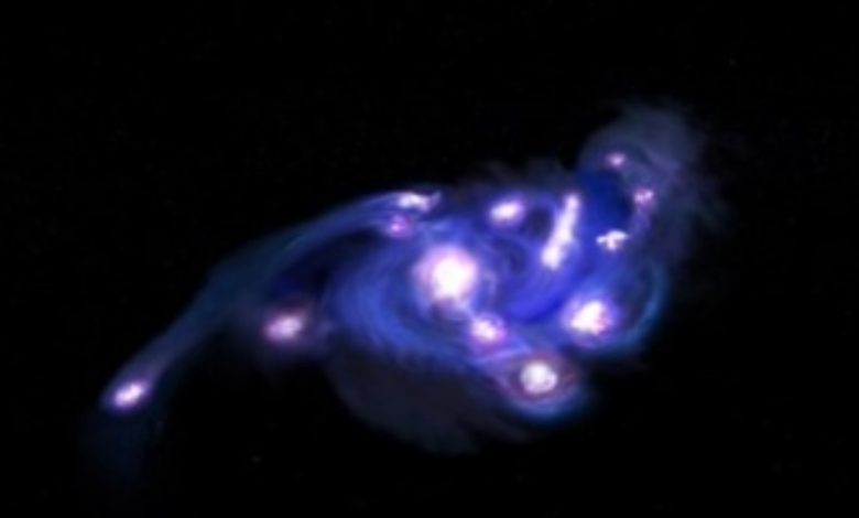 NASA descobre galáxia 'Cosmic Grapes' no início do universo
