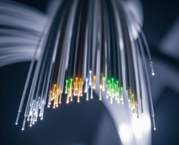Petrovich et al. report a microstructured optical waveguide with unprecedented transmission bandwidth and attenuation. Image credit: Gemini AI.